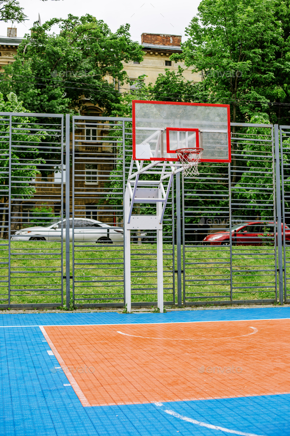 Photo of modern public basketball playground near school outdoor Stock
